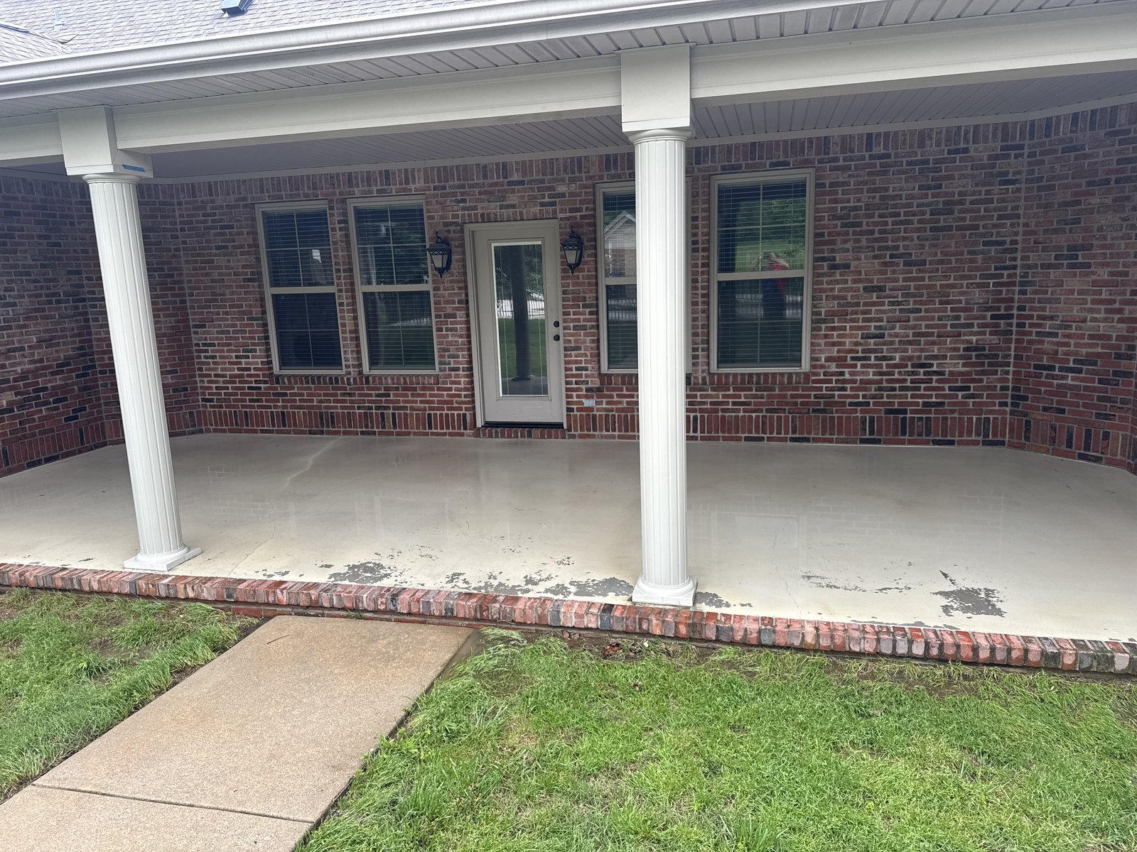 Covered brick porch after pressure washing