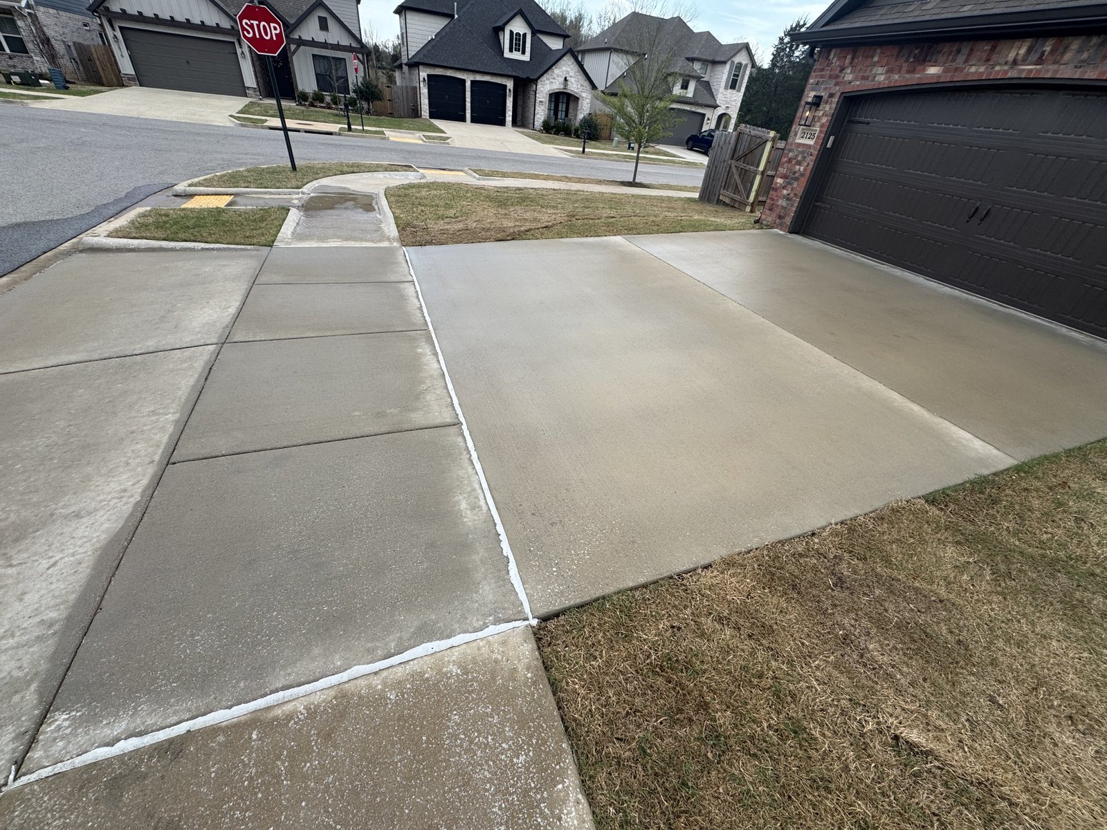 Suburban driveway after pressure washing